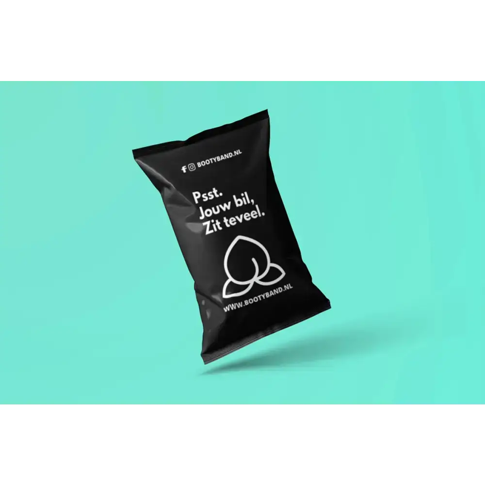 Zwarte booty band met peach logo en siliconen details voor optimale workout plezier