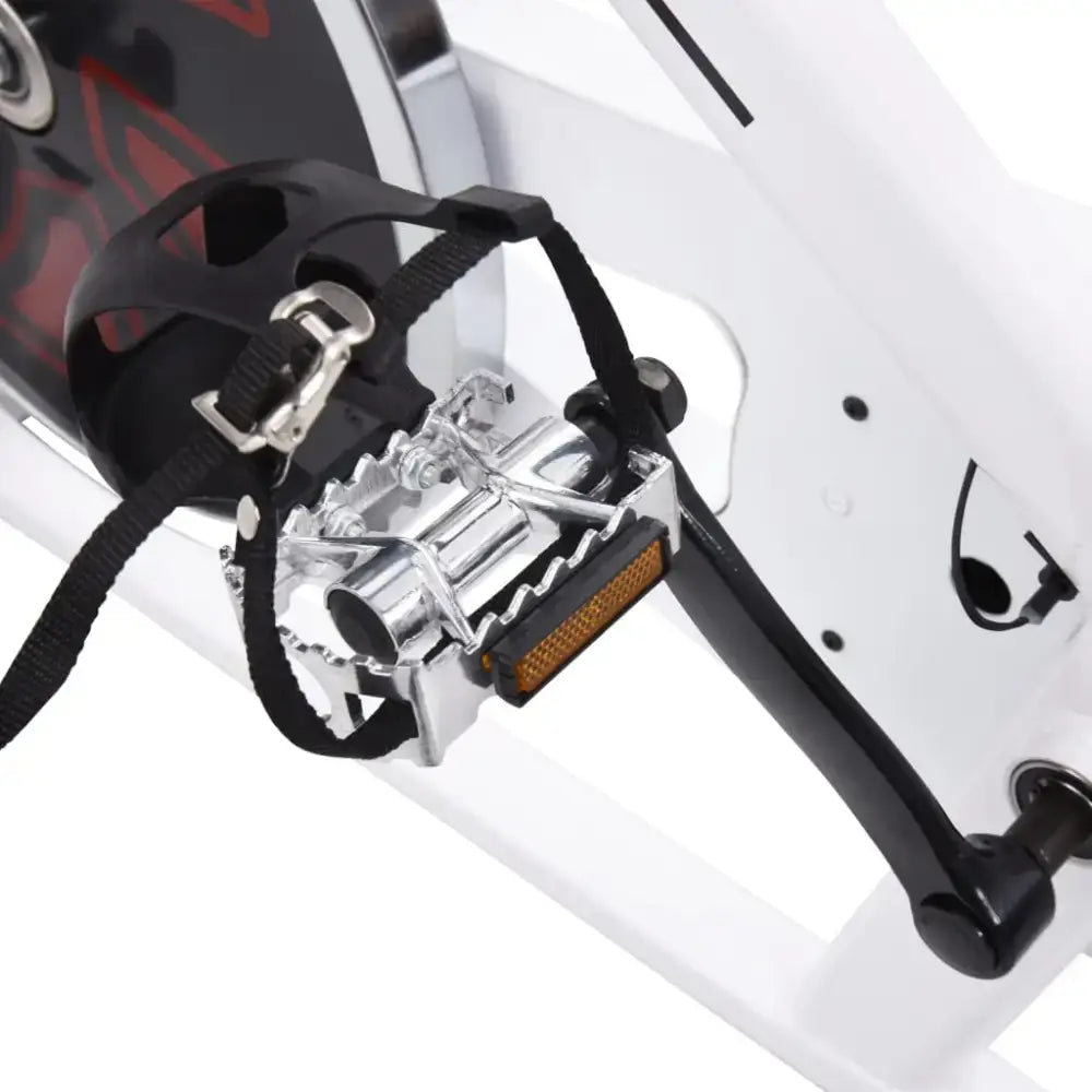 Pedal van Witte compacte hometrainer met verstelbaar zadel en rubberen riemaandrijving