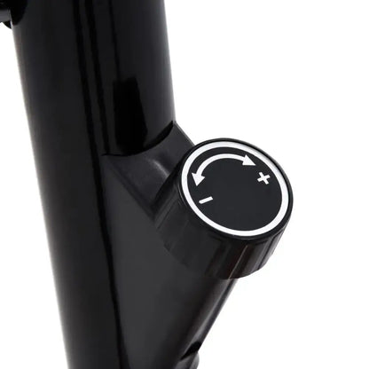 Zwarte verstelbare knop op stevige hometrainer met verstelbaar zadel