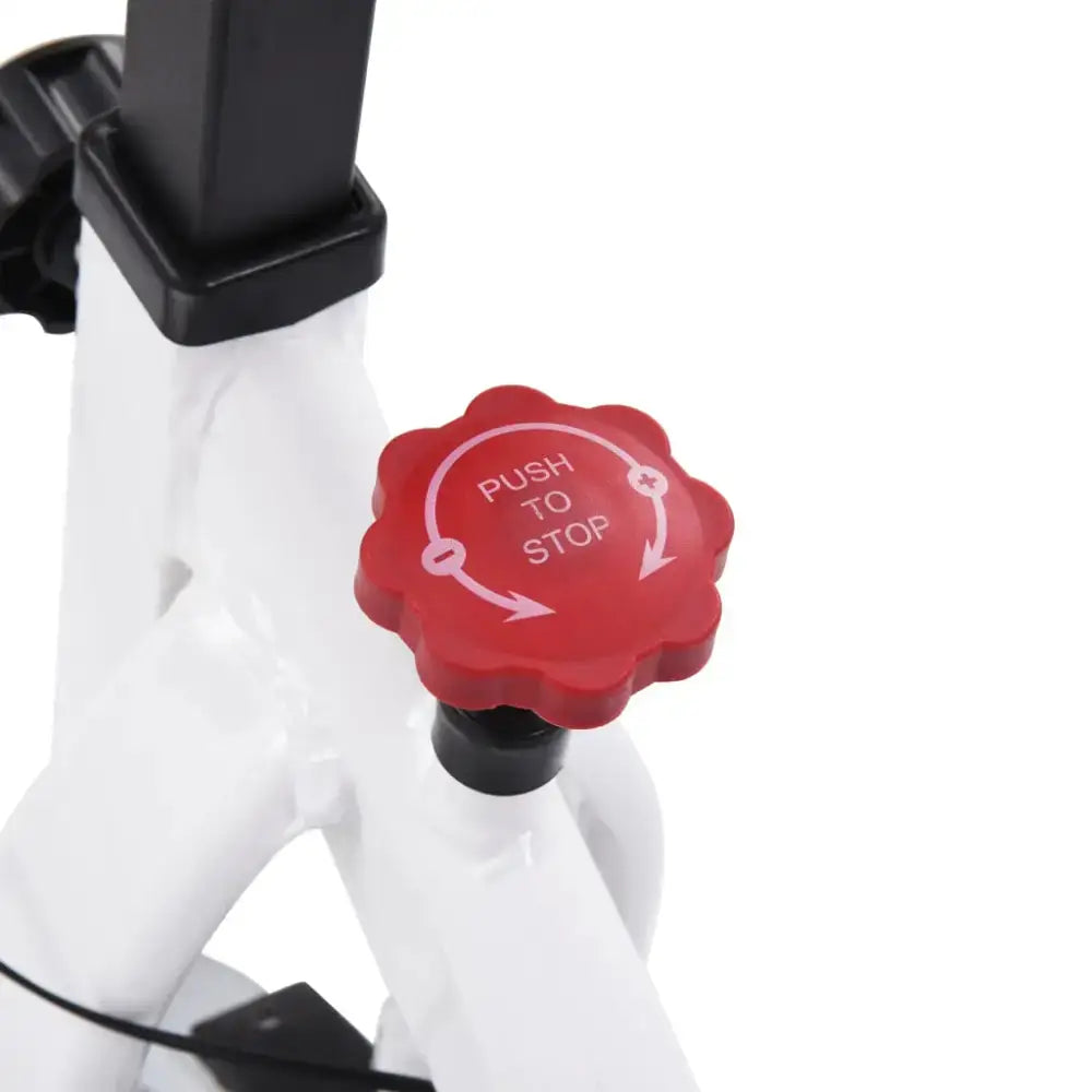Red resistance knob op Witte compacte hometrainer met verstelbaar zadel voor rubberen riemaandrijving